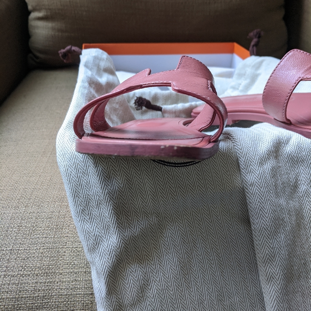 Salmon color Hermes sandals.